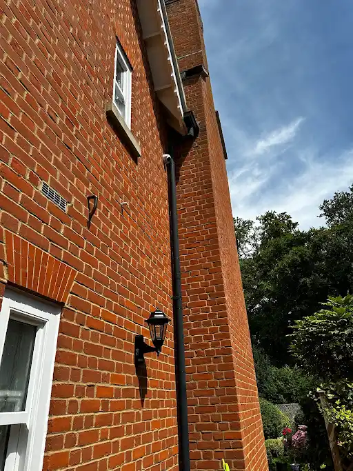 CCTV camera on residential brick property